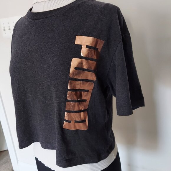 Puma women's cropped t-shirt with a rose gold vertical logo.  Sz L. Cotton mix. - Picture 2 of 4